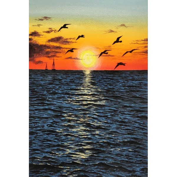 Birds over Sea at Sunset